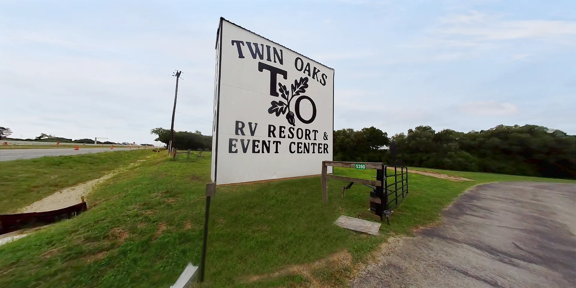 Twin Oaks Resort roadside entrance sign