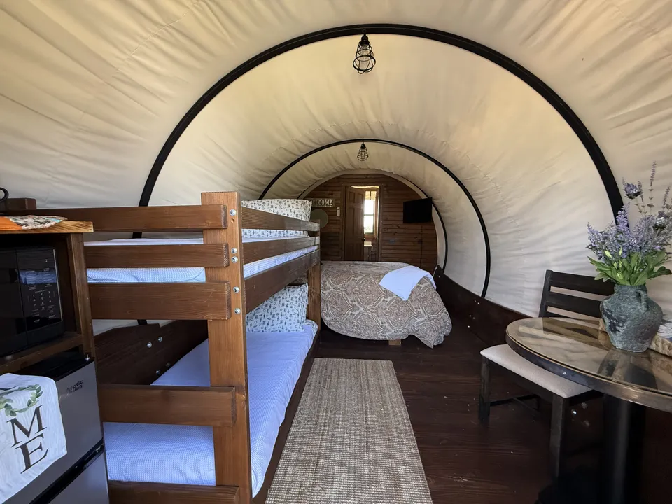 Bunk beds inside a Conestoga wagon